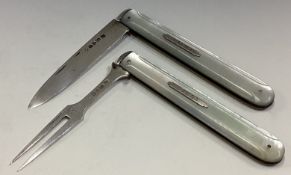 A rare Victorian silver and MOP traveling knife and fork.