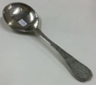 An 18th Century Norwegian silver spoon engraved with house and flower to handle.