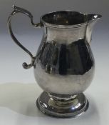 An 18th Century silver sparrow shaped cream jug.
