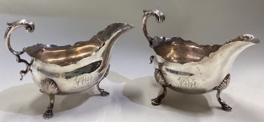 A pair of large 18th Century George III silver sauce boats.