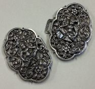 A fine pair of Thai silver interlocking buckles.