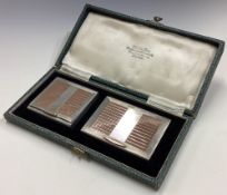 A rare silver and gold inlaid cigarette set in presentation box.