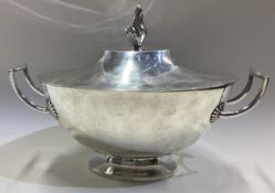 A large good quality Continental silver two-handle tureen with gilt interior to lift-off cover.