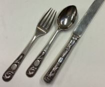 A Chinese export silver three piece cutlery set. Hong Kong.