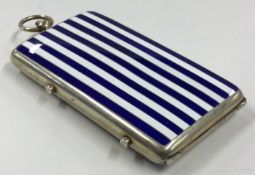 A rare silver and blue and white enamelled double-sided combination compact / case.