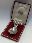 A cased silver and enamelled caddy spoon commemorating Edward VI in Goldsmiths retailer box.