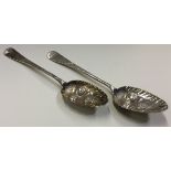 A heavy pair of 18th Century George III silver berry spoons. London 1799.