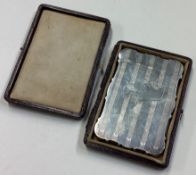A cased 19th Century American silver card case.
