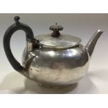 A silver bullet shaped teapot. London 1895.