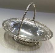 A fine 18th Century George III silver swing handled basket pierced with stars. Sheffield 1774.