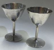 A pair of Chinese export silver martini cups.