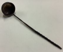 A large 19th Century silver toddy ladle.