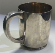 A heavy silver Finnigans pint mug. London 1945.