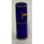 OF NAUTICAL INTEREST: A silver and blue enamelled lipstick holder.