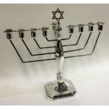 A silver Judaica menorah / candelabra.