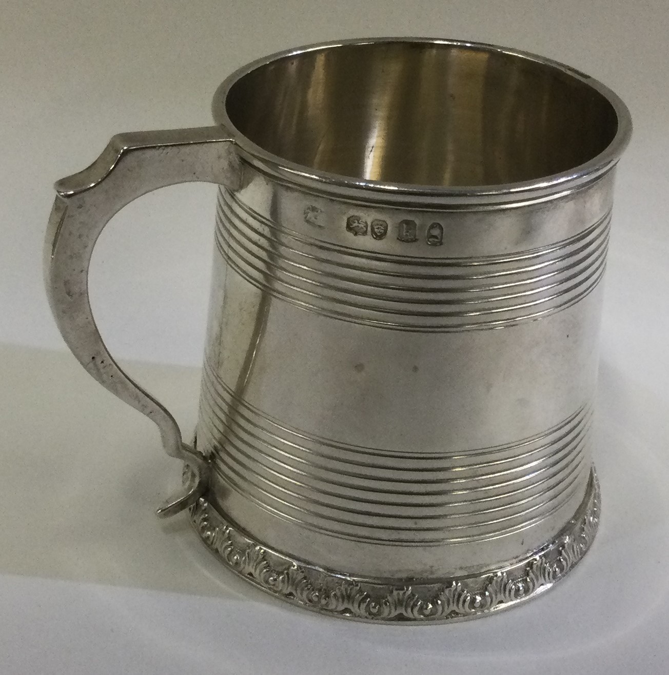 A George III silver reeded tankard. London 1825.