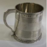 A George III silver reeded tankard. London 1825.