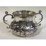 A rare and unusual 17th Century silver porringer with central armorial.