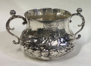 A rare and unusual 17th Century silver porringer with central armorial.