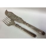 A fine pair of Victorian silver fish servers.