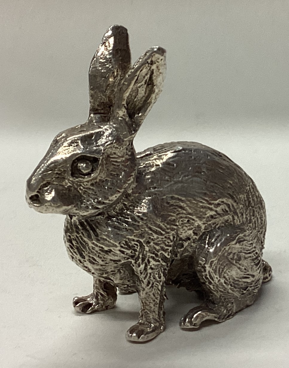 A novelty heavy silver figure of a hare in seated position. - Image 2 of 4