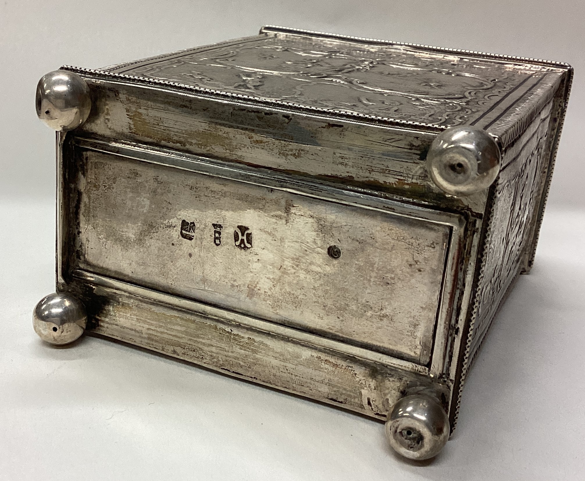 A 19th Century Dutch silver tea caddy with embossed decoration. - Image 4 of 4