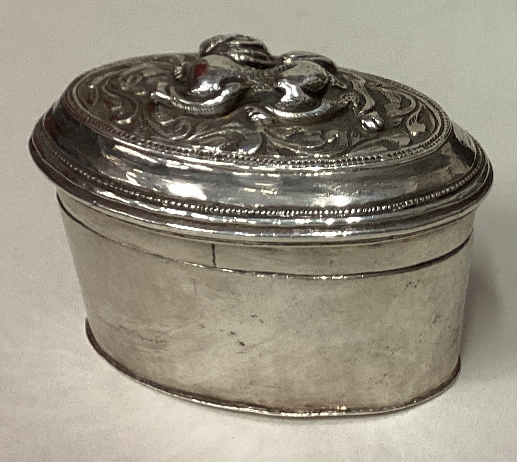 A 19th Century Turkish silver box with lift-off cover.