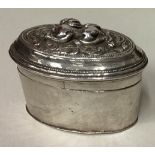 A 19th Century Turkish silver box with lift-off cover.