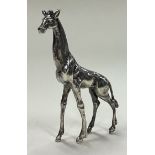 A contemporary silver figure of a giraffe.