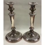 A good pair of Old Sheffield silver plated candlesticks.