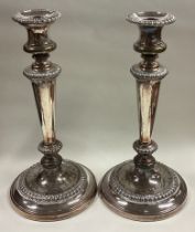 A good pair of Old Sheffield silver plated candlesticks.