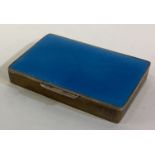 A silver plated and blue enamelled snuff box.