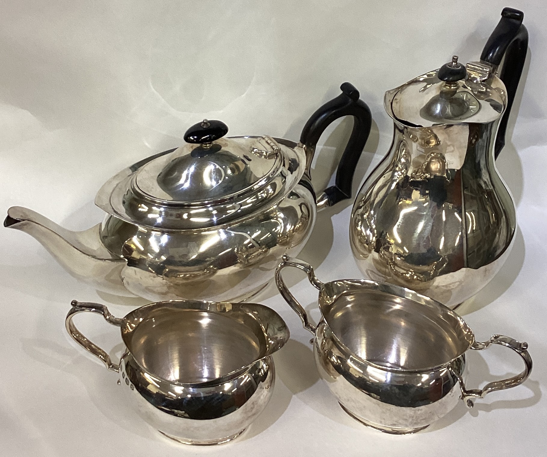 A good four-piece silver tea service of stylised form.