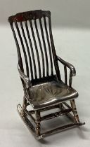 A novelty silver model of a rocking chair.