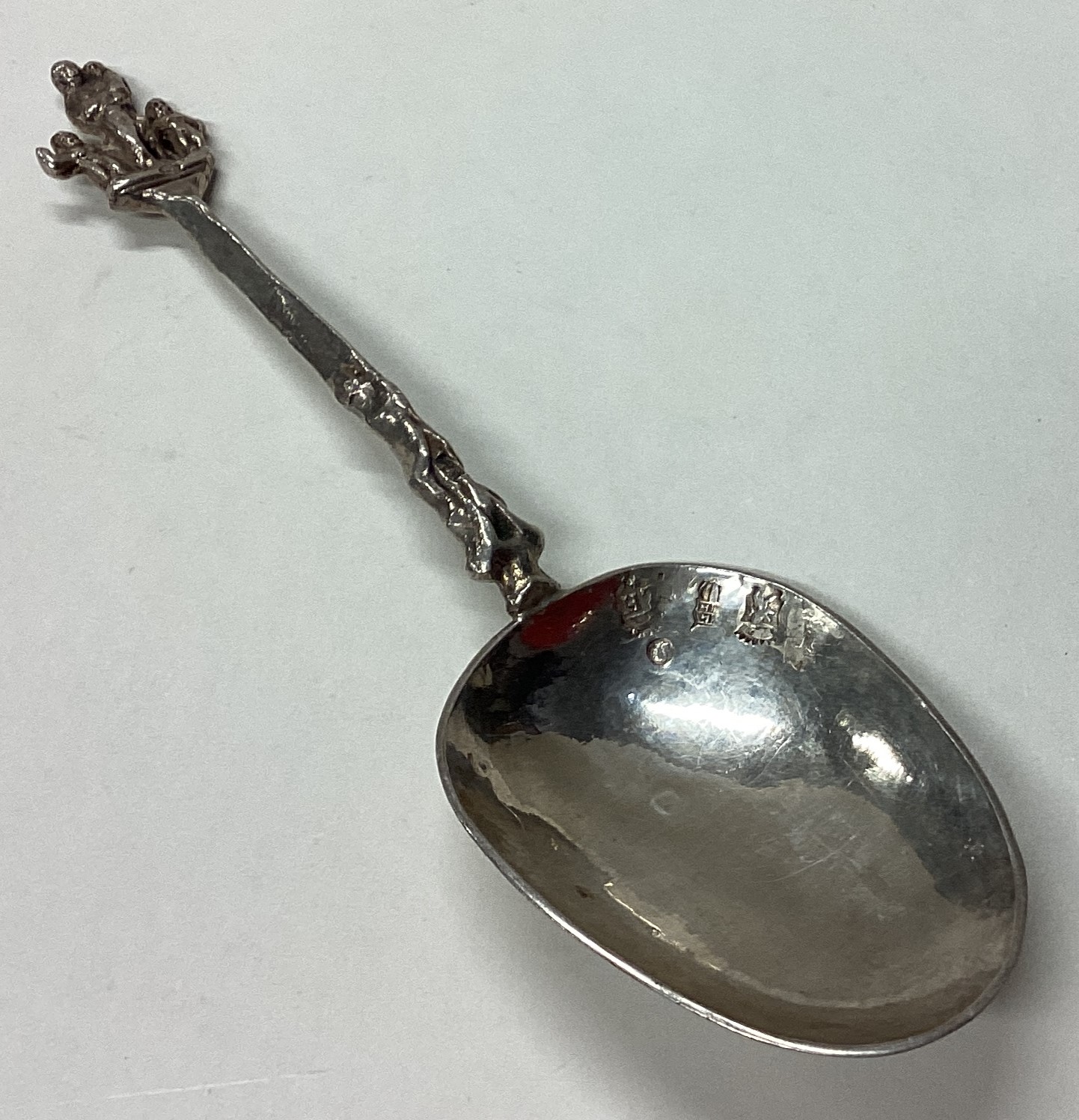 An Antique Dutch silver spoon with figural handle.