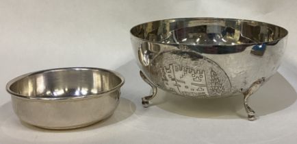 A heavy Continental silver pill dish together with a similar smaller example.