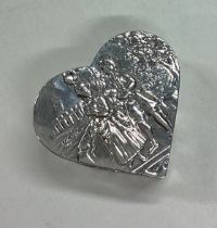 A Victorian silver heart shaped box bearing import marks.