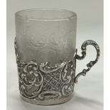 A Russian silver tea glass holder.