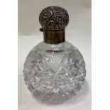 A novelty Victorian silver and glass scent bottle.