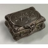 A good chased silver trinket box decorated with figures.