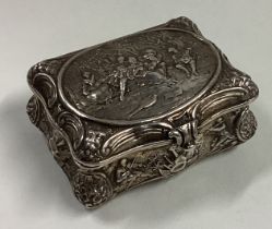 A good chased silver trinket box decorated with figures.