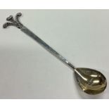 A large silver spoon commemorating the Prince of Wales.