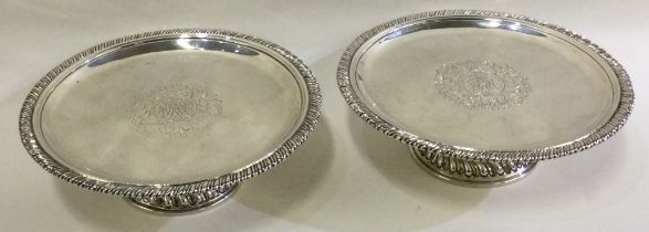 A pair of circular early 18th Century silver tazzas.