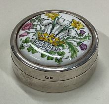 A commemorative silver snuff box.