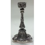 A heavy Victorian silver chamberstick.