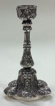 A heavy Victorian silver chamberstick.