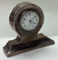 A large silver table clock. Birmingham 1946.