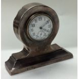 A large silver table clock. Birmingham 1946.