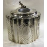 An 18th Century Georgian silver chinoiserie tea caddy.