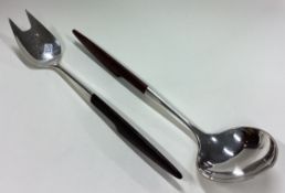 A pair of Art Deco Danish Sterling silver salad servers.